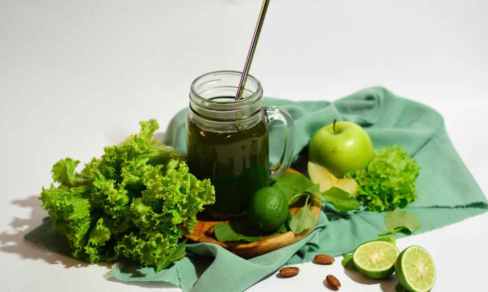 Green juice with fruits and vegetables.