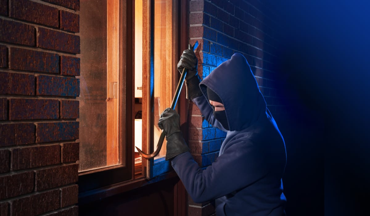 Burglar Breaking Into House