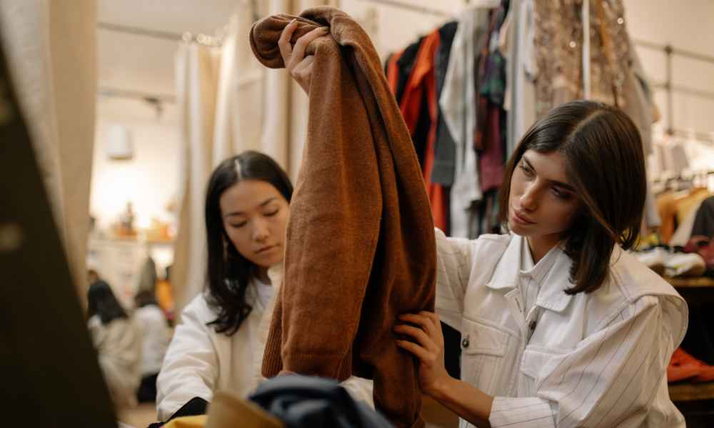 Friends shopping at thriftstore.