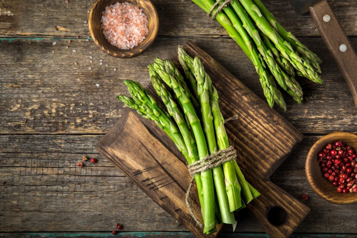 Green Asparagus on Wooden Background