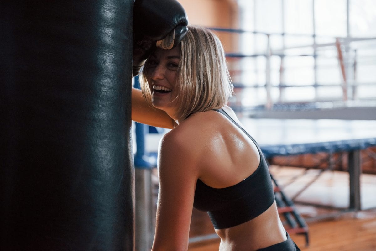 Woman in Boxing Gloves Smiling