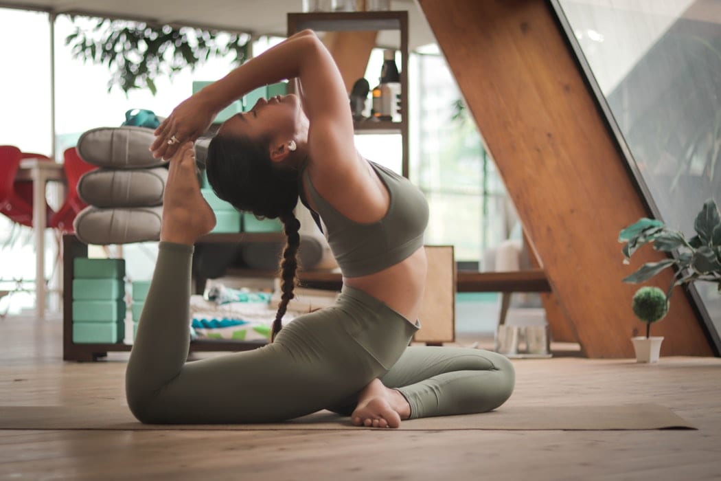 Woman Doing Yoga Pose in Leggings