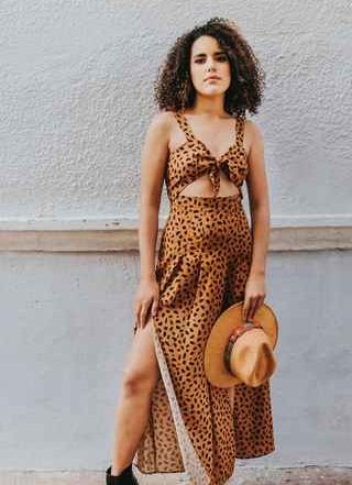 Women on a leopard two piece set and some black boots