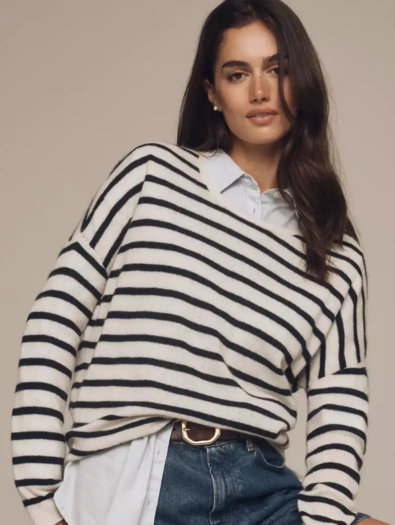 Striped black and white sweater layered over white shirt, casual chic fall tops.