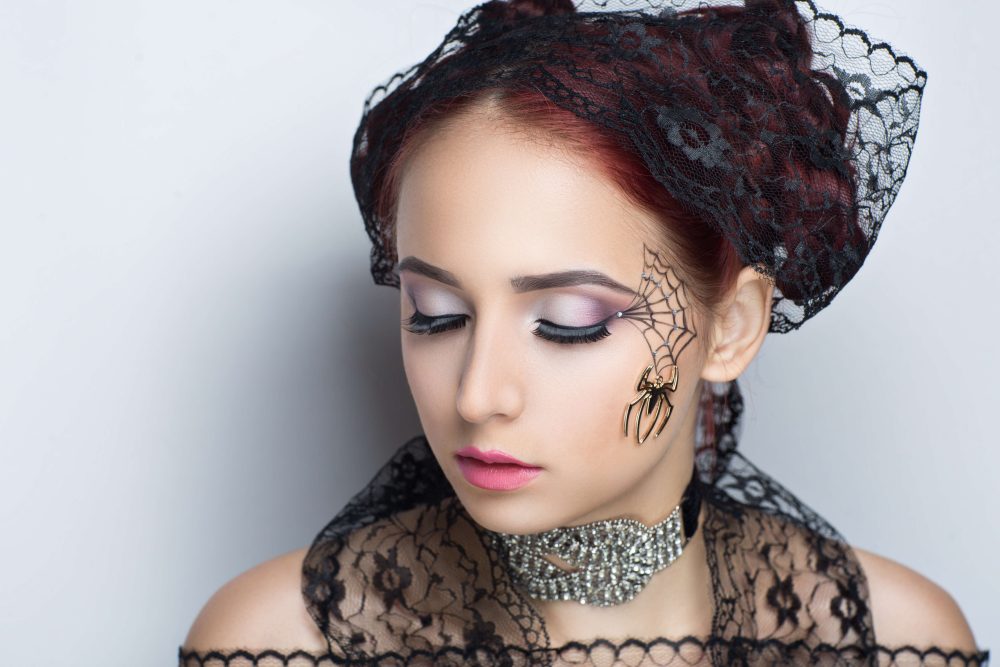 Girl with spider web eyeliner makeup