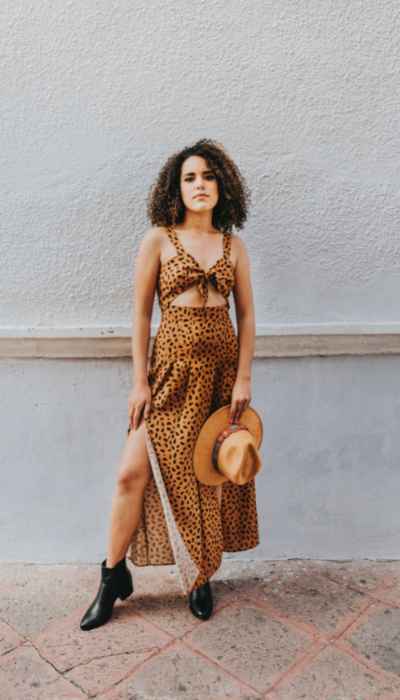 Women on a leopard two piece set and some black boots
