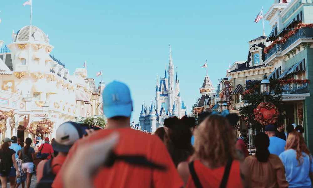 People walking along the street of Disney World in Orlando.