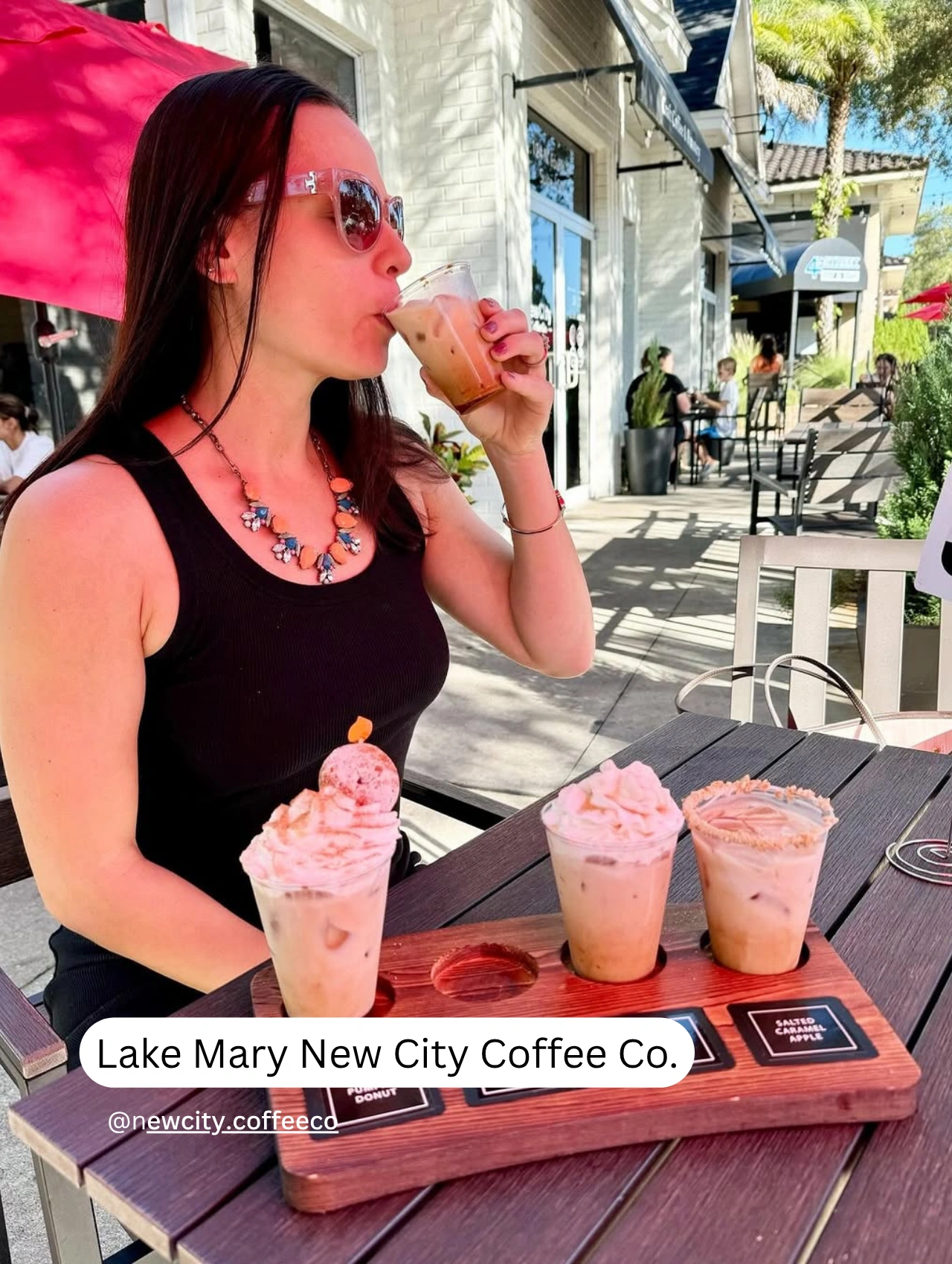 Woman enjoying an iced coffee flight at a Lake Mary one of the best coffee shops in Orlando with outdoor seating.