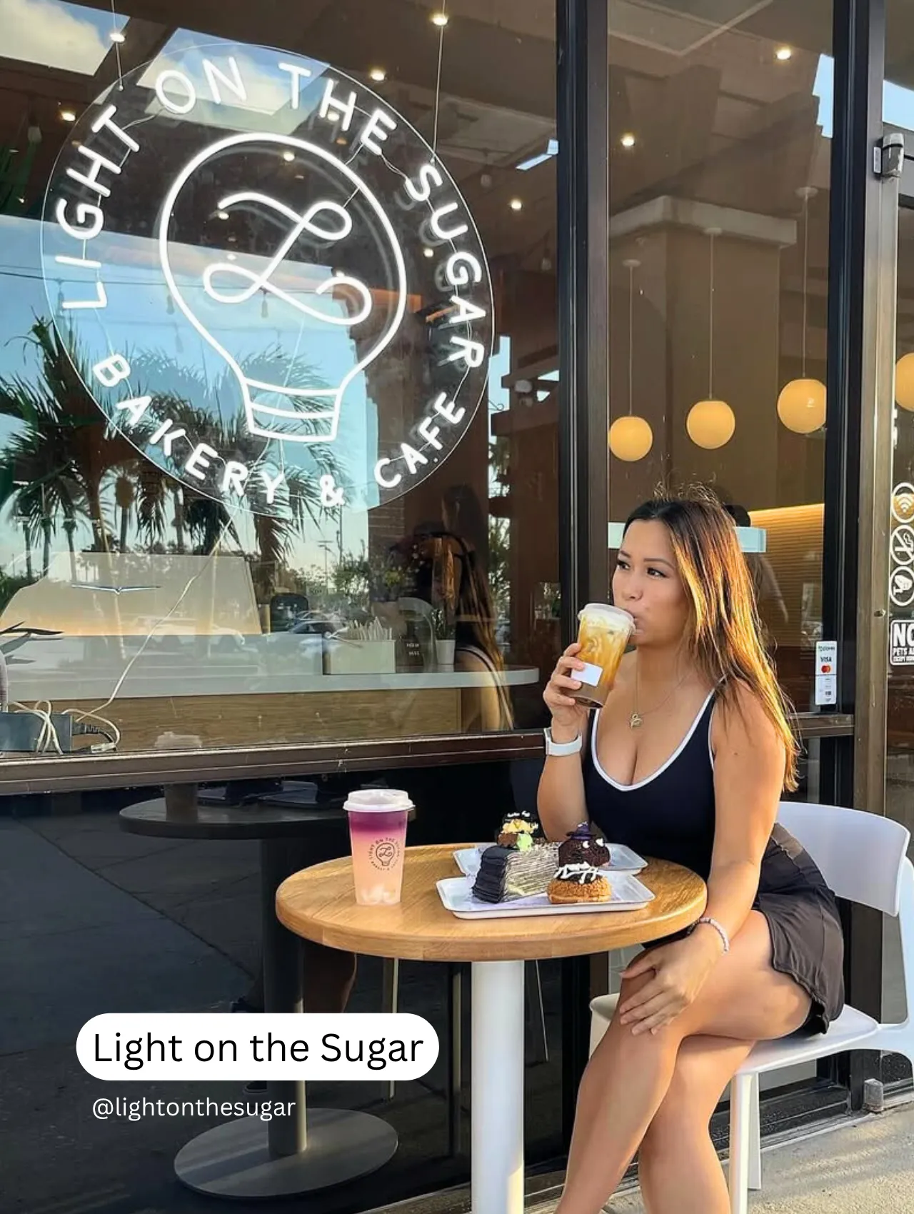 Woman enjoying coffee and desserts at Light on the Sugar’s cozy outdoor table – best coffee shop in Orlando for sweet treats.