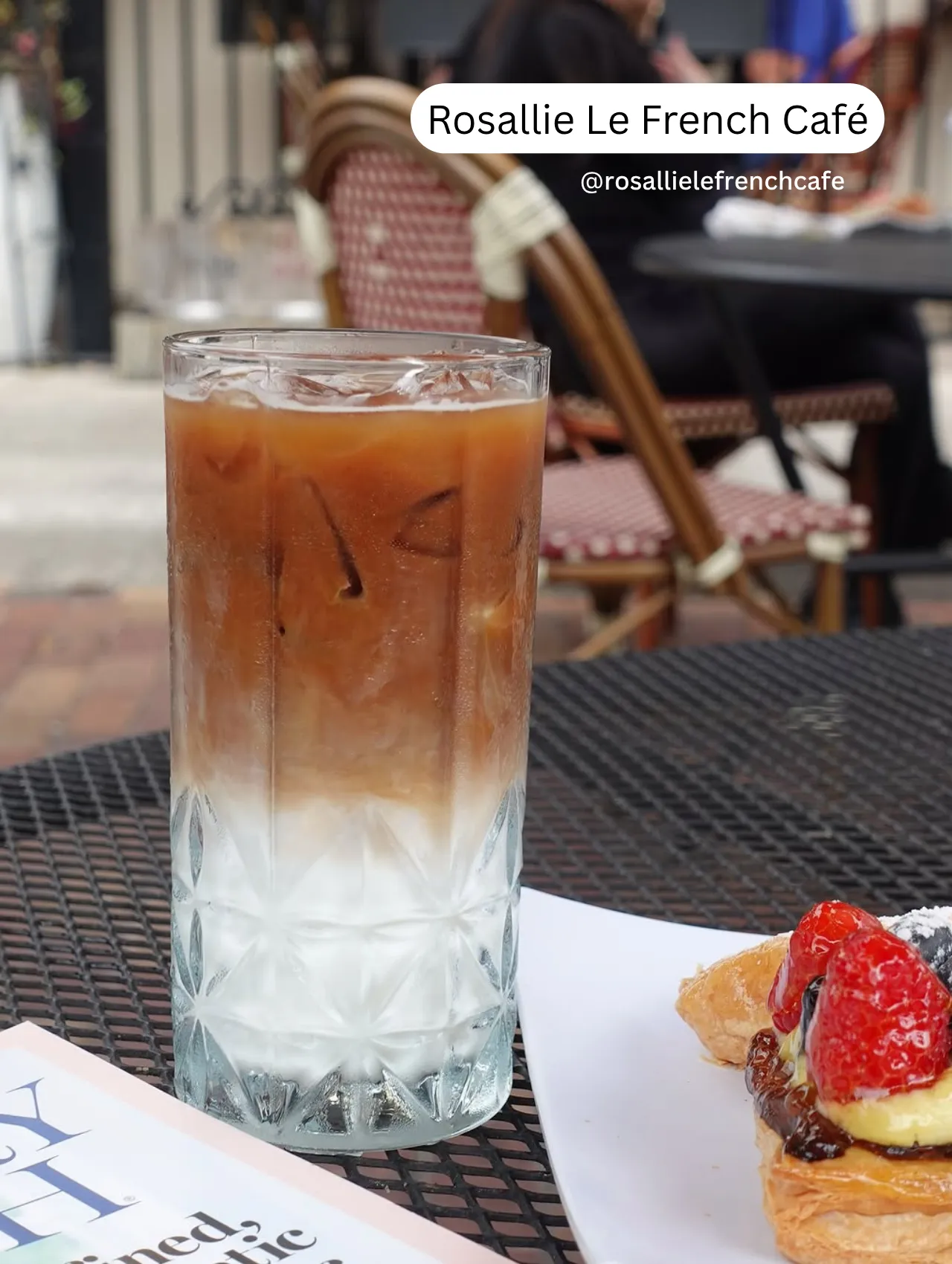 Close-up of iced coffee and fruit pastry at Rosallie Le French Café in Orlando – charming French-style coffee shop.