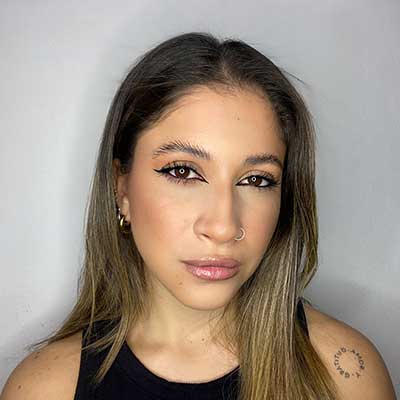 Woman with cat eye makeup.