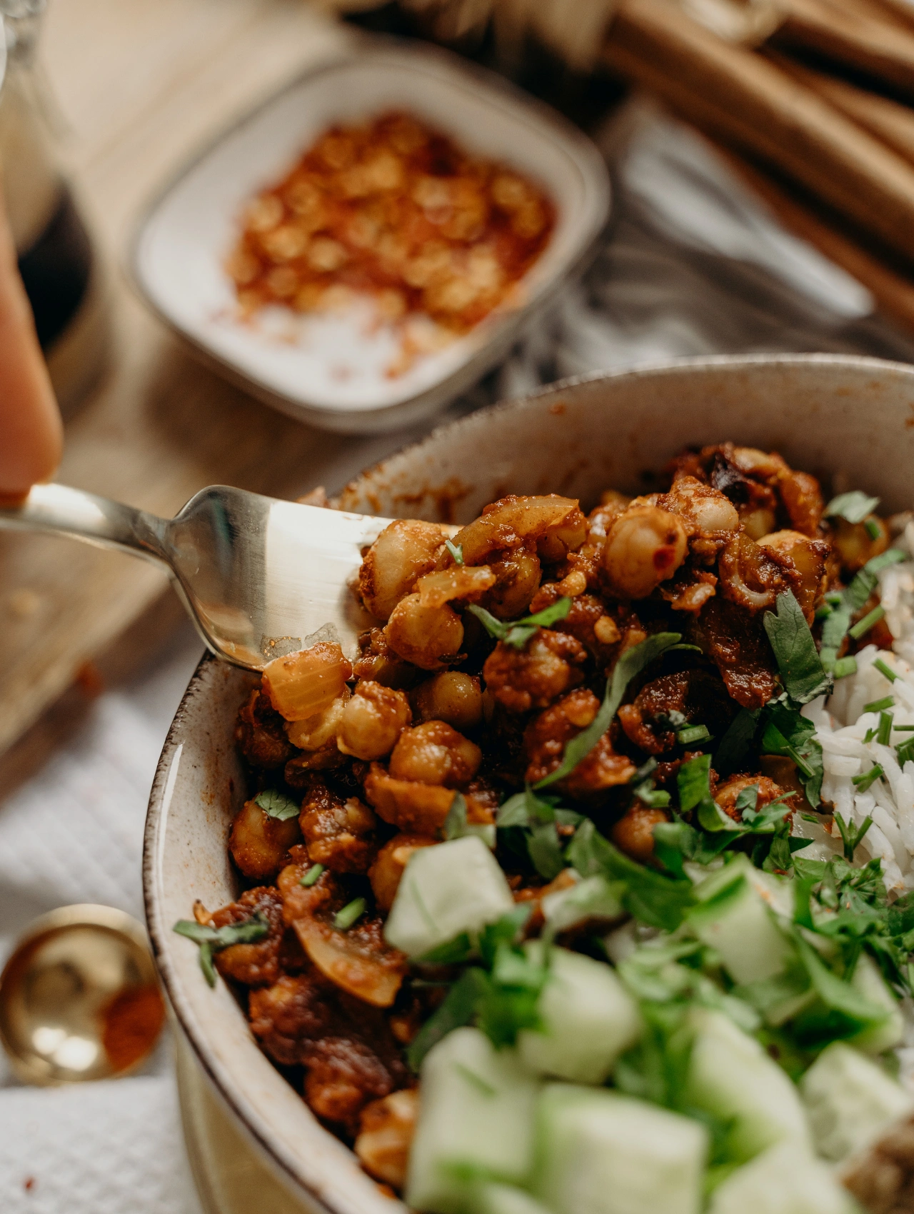 Close-up of a chickpea and vegetable dish, a flavorful vegan option for Thanksgiving Menu ideas.