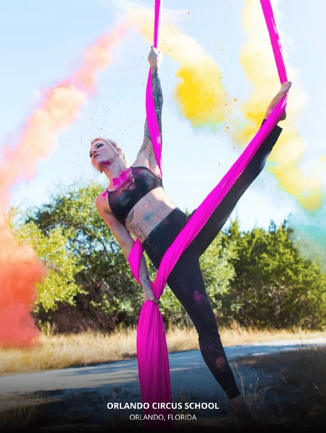 Colorful aerial silk performance at Orlando Circus School — a top pick in our 2025 list of exciting things to do in Orlando with kids.