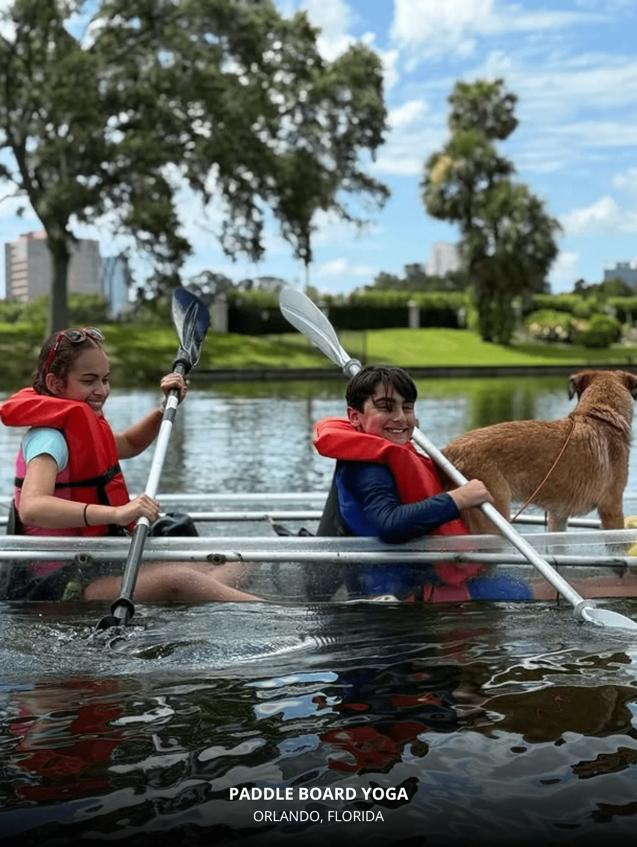 Two smiling kids in life jackets paddling on a clear kayak with a dog at Paddle Board Yoga – Title: 17 Interesting and Exciting Things to Do in Orlando with Kids