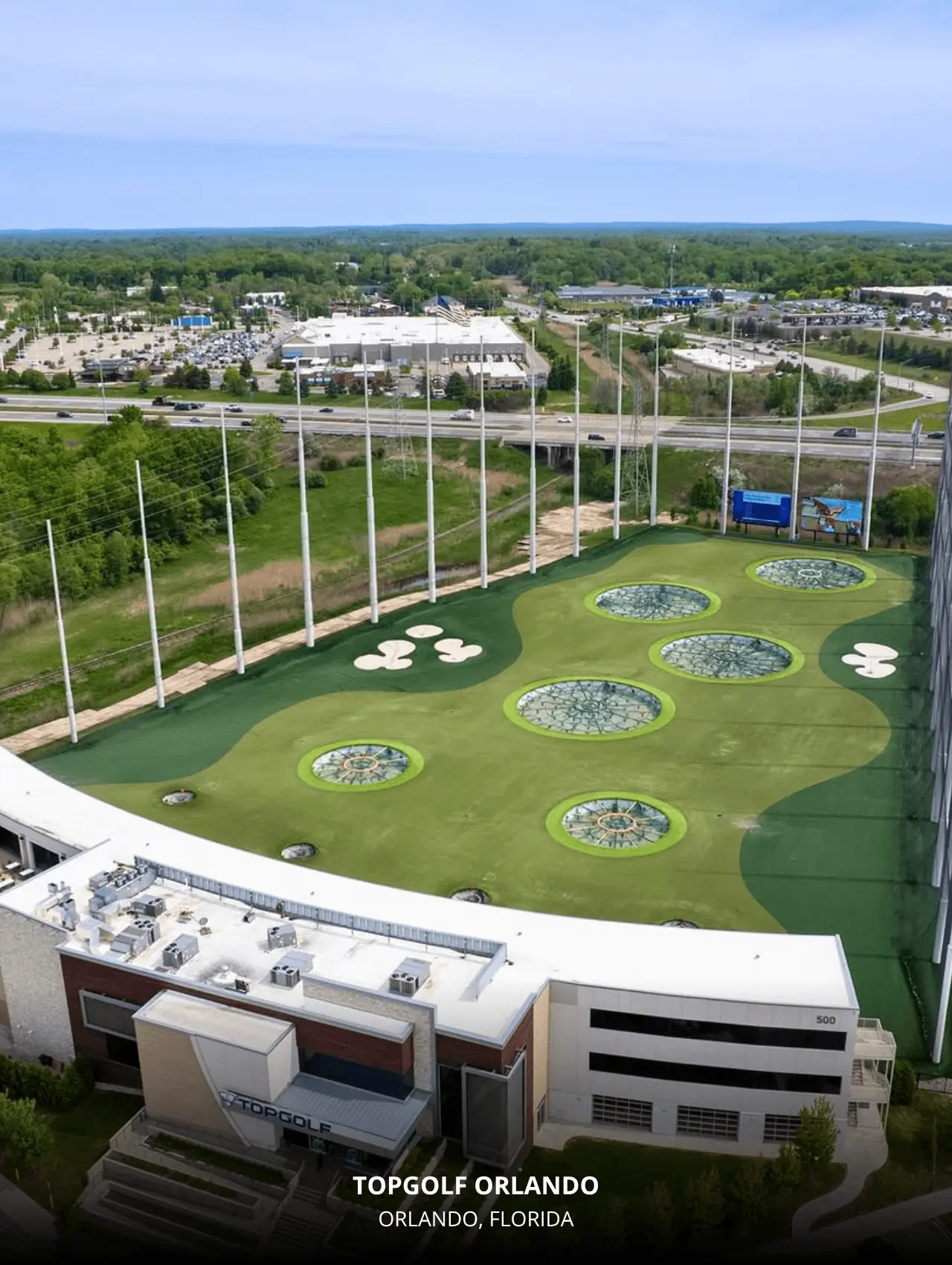 Aerial view of Topgolf Orlando showcasing the modern driving range with targets – things to do in Orlando.
