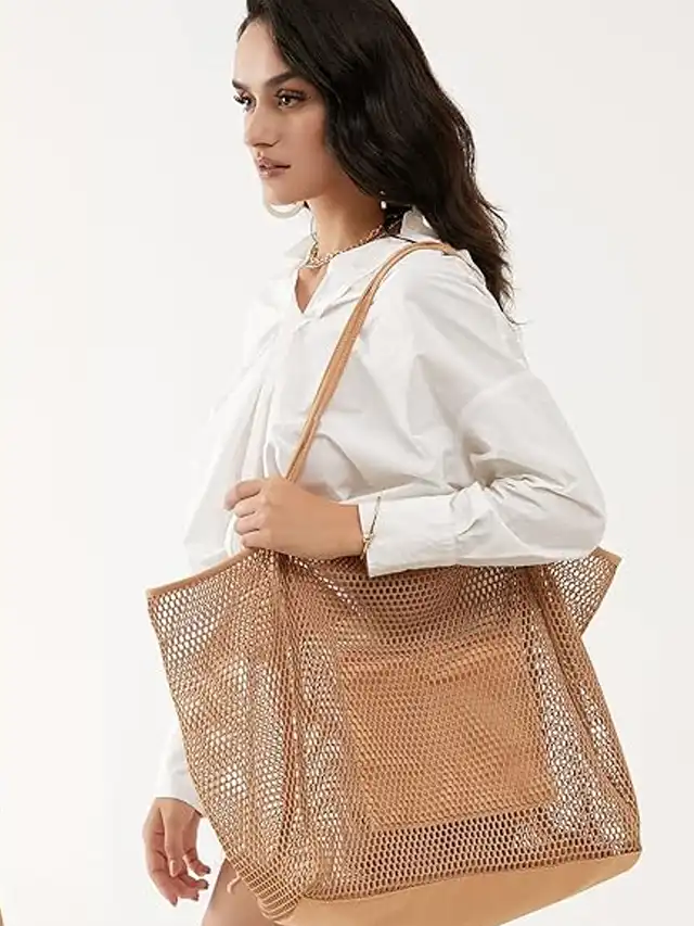 a woman holding a mesh bag