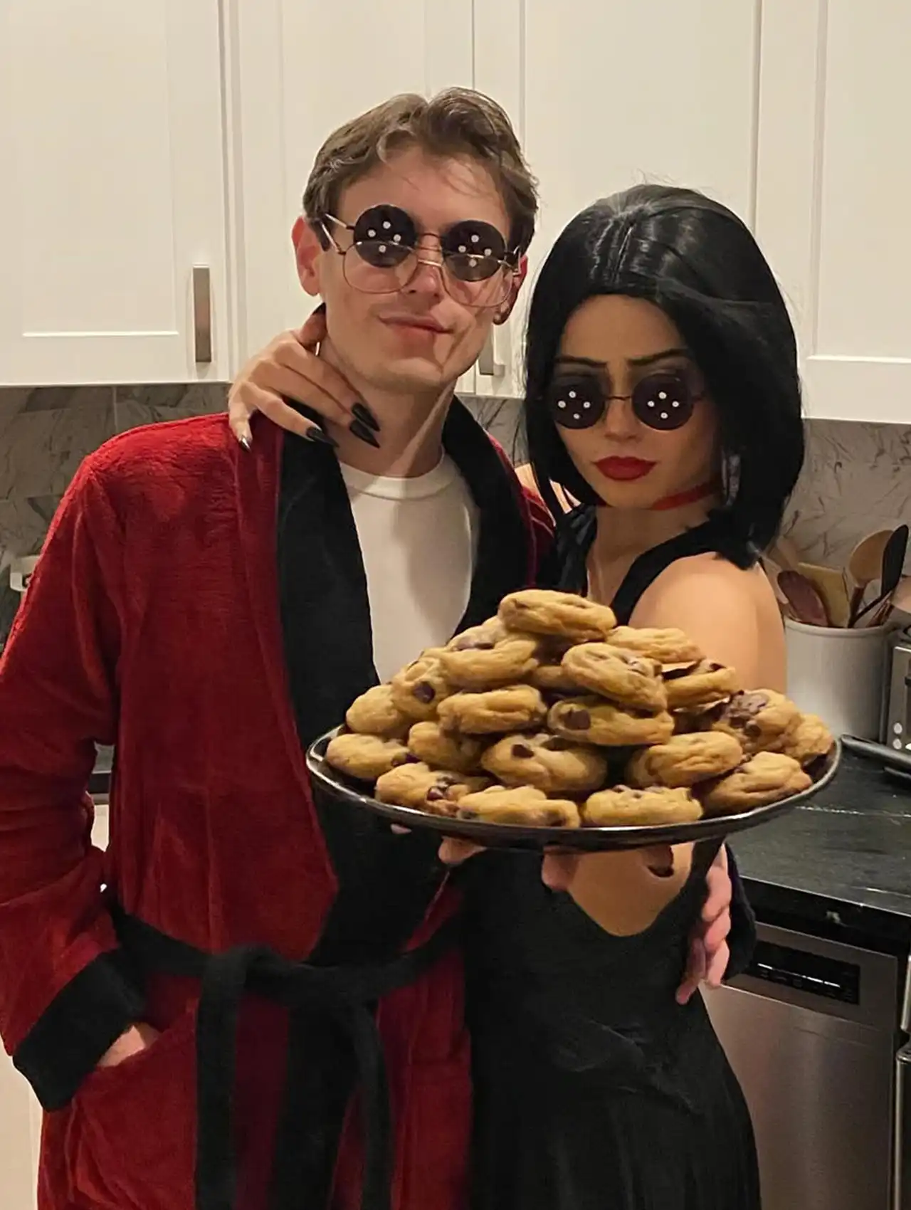 Coraline’s Other Parents couple costume with sunglasses and cookies, most popular halloween costumes