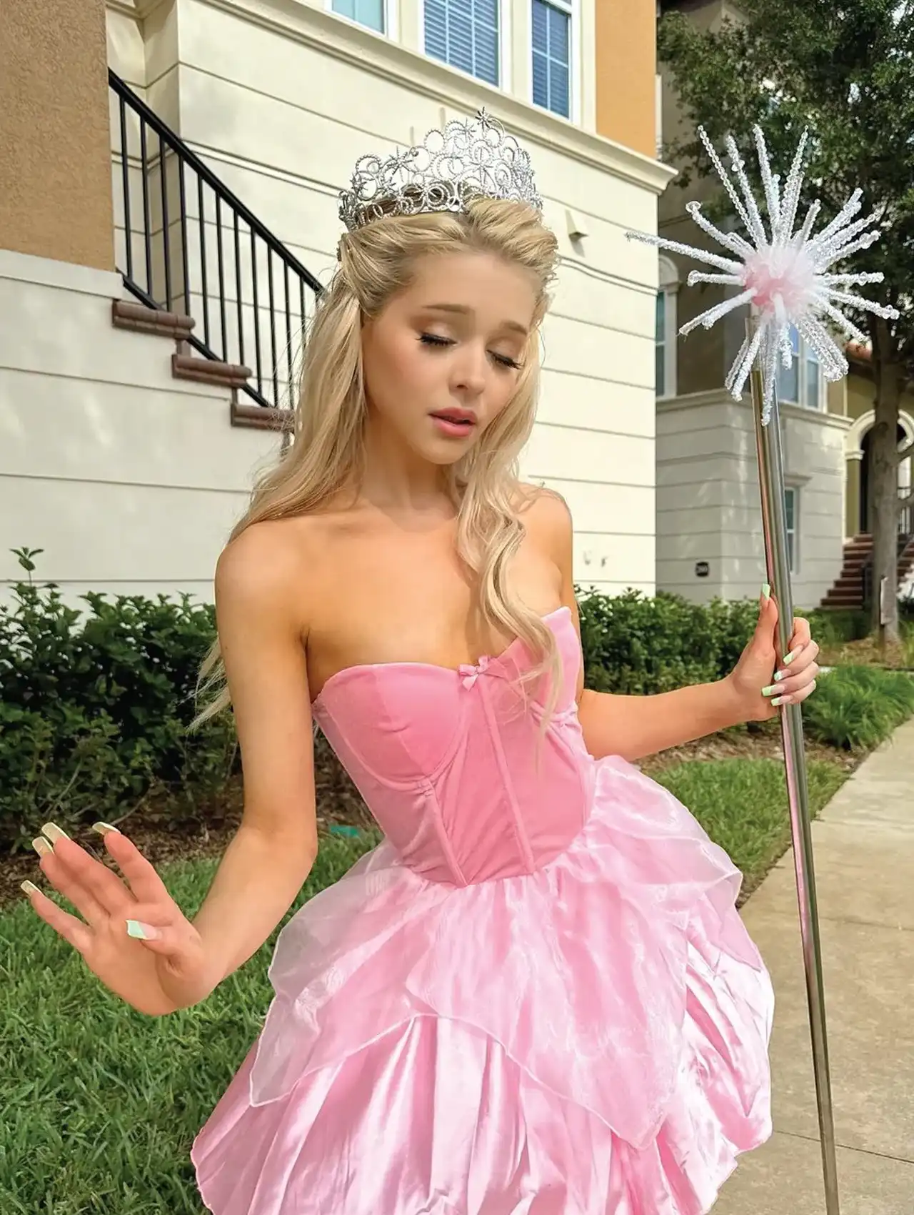 Glinda princess costume with pink dress and crown, most popular halloween costumes