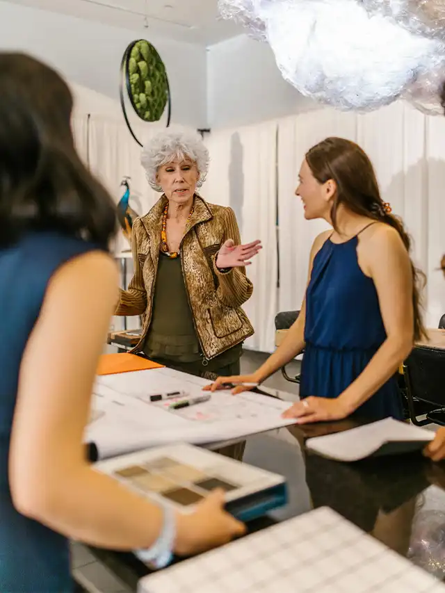 a woman talking to a group of women