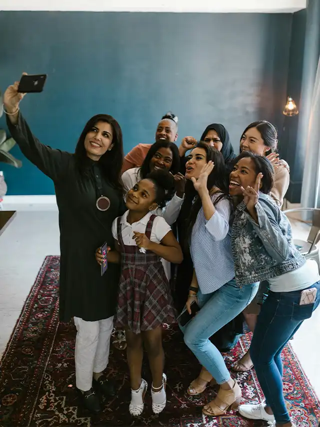 a group of women taking a selfie