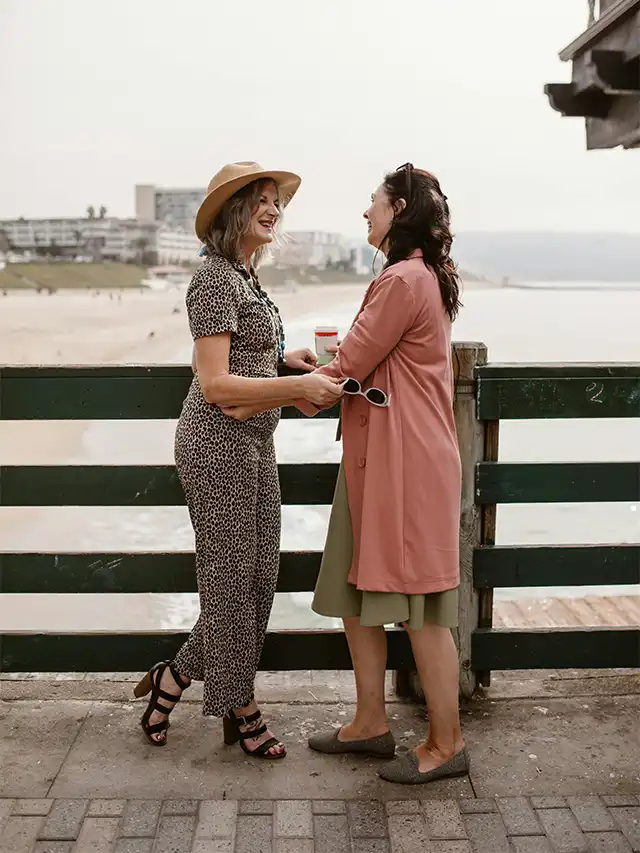 two women standing next to each other