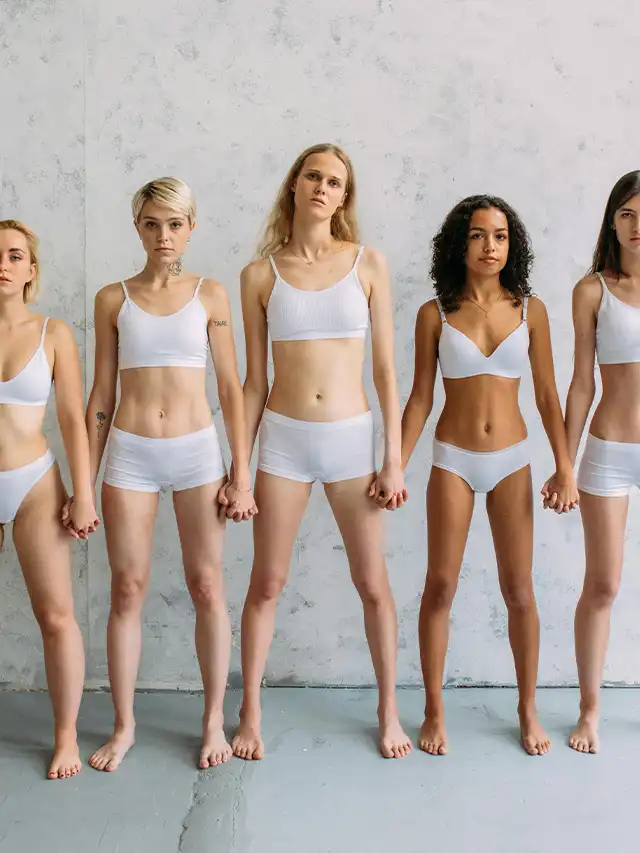 a group of women in white underwear