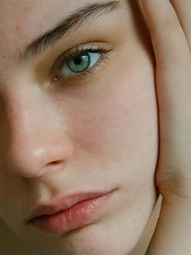 a close up of a woman's face