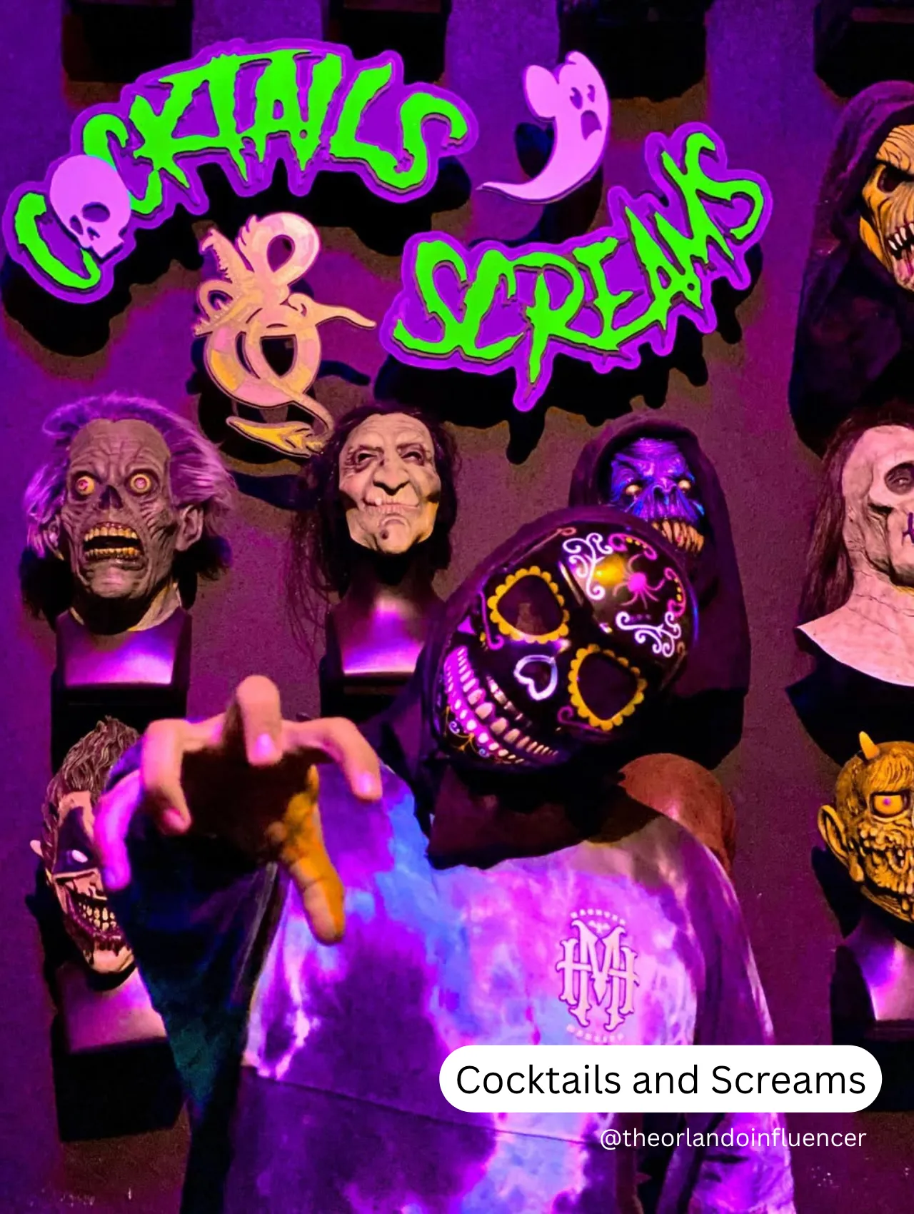 Things to Do in Orlando Besides The Theme Parks – neon-lit Cocktails & Screams bar with spooky masks, a costumed visitor reaching out, unique nightlife attraction in downtown Orlando.