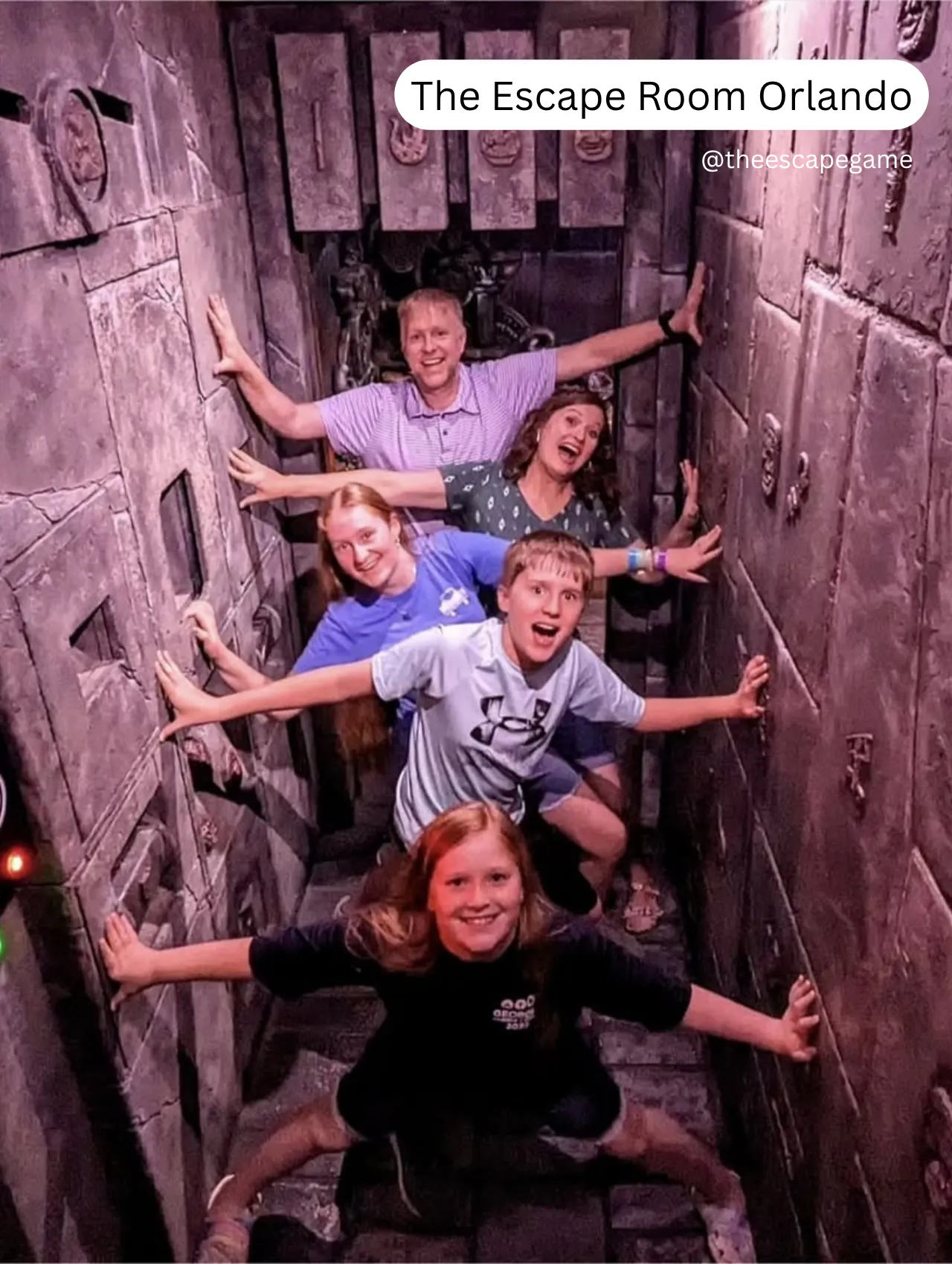 Things to Do in Orlando Besides The Theme Parks – family posing in a themed adventure room at The Escape Game Orlando, a fun group activity and immersive puzzle challenge.