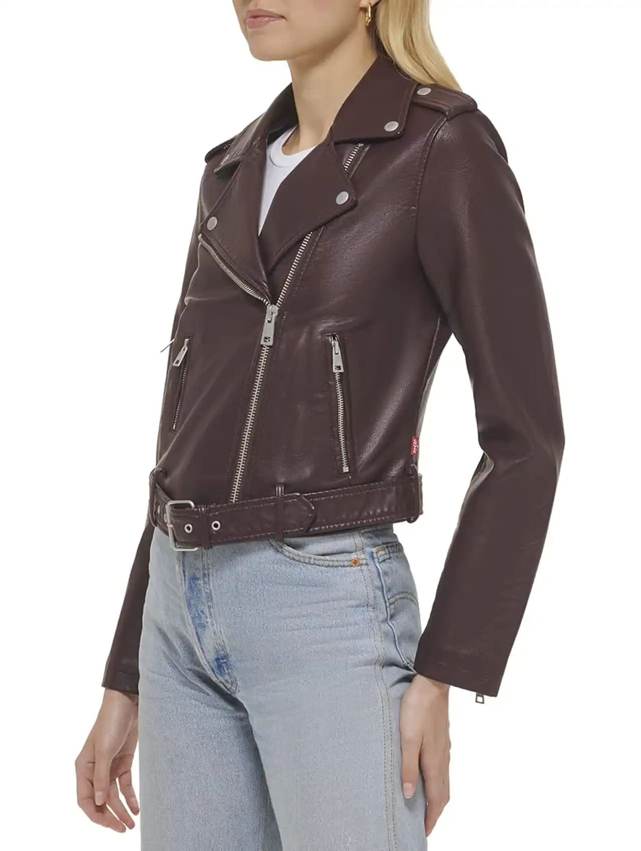 Woman wearing a burgundy cropped leather moto jacket with silver zippers, fall clothing for women