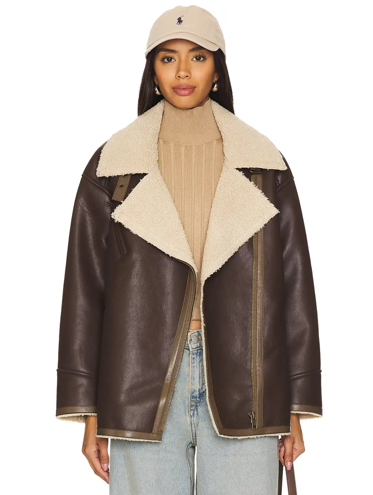 Woman wearing a burgundy leather cropped moto jacket with shearling trim, fall clothing for women