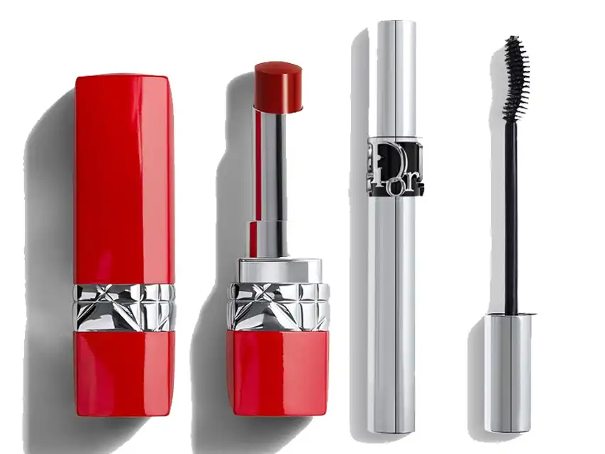 a group of red lipsticks and a black mascara