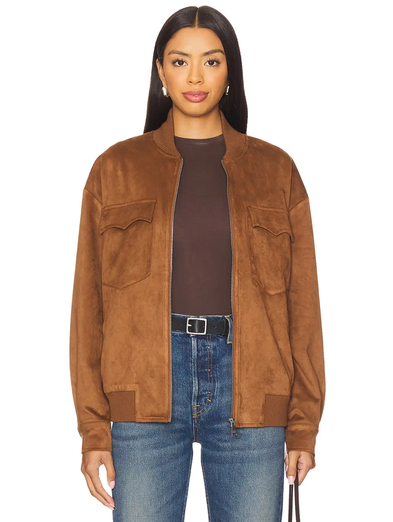 Woman wearing a brown suede jacket styled as classic fall jackets.