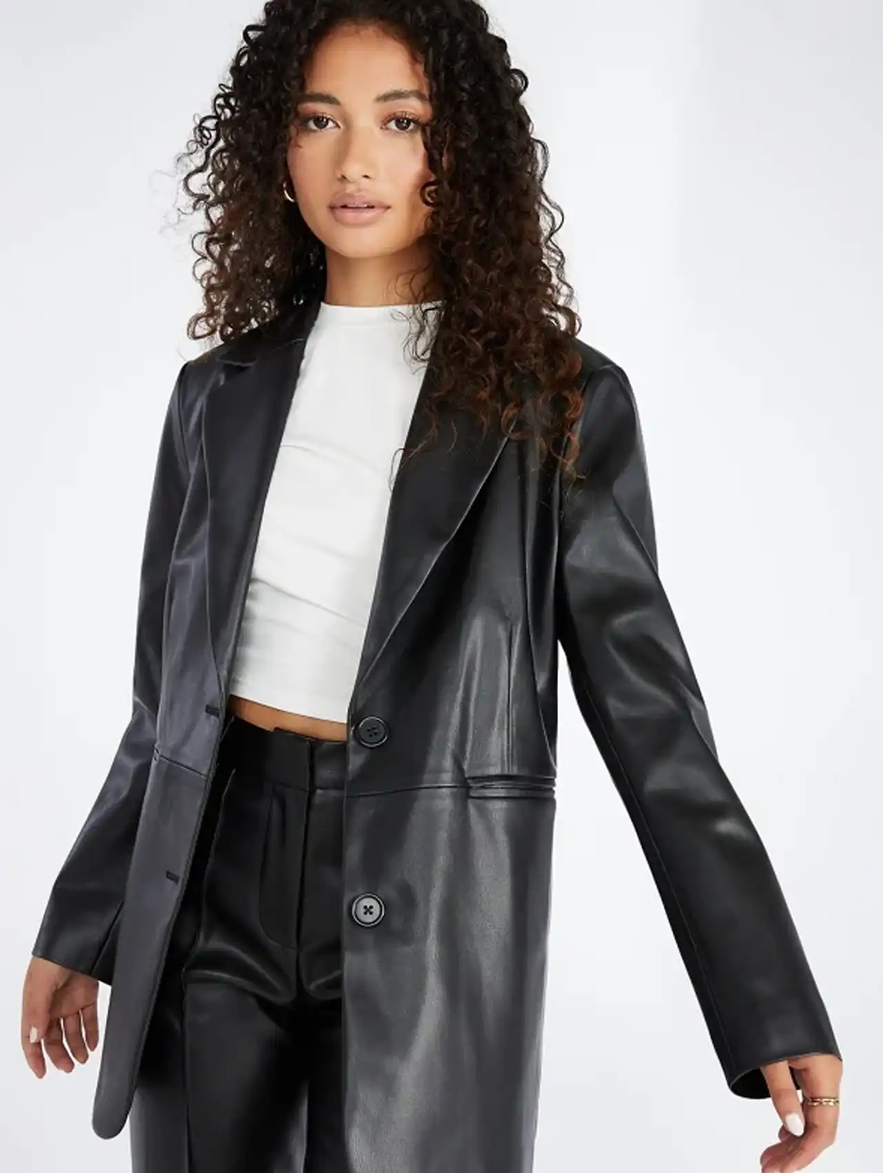 Woman wearing a black leather blazer for modern fashion inspiration