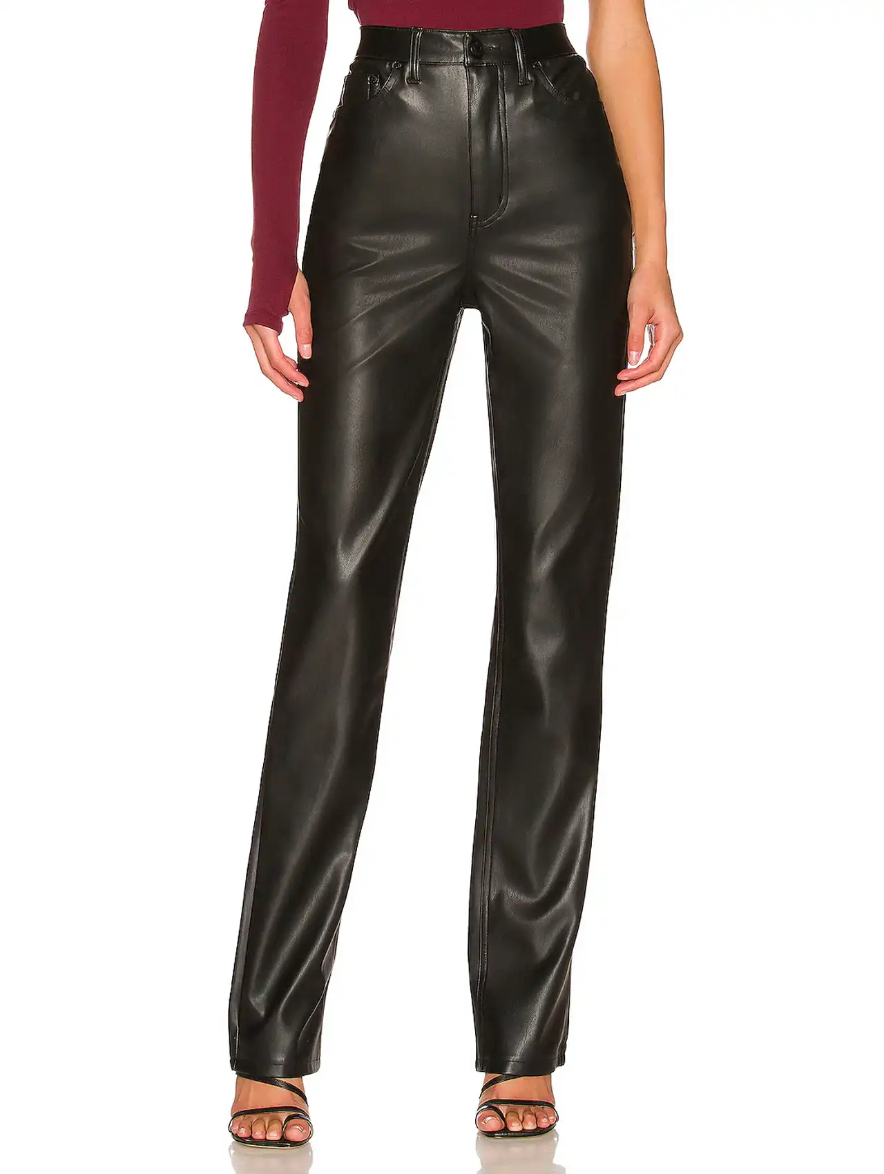 Woman in straight-leg black leather pants showcasing edgy fashion inspiration