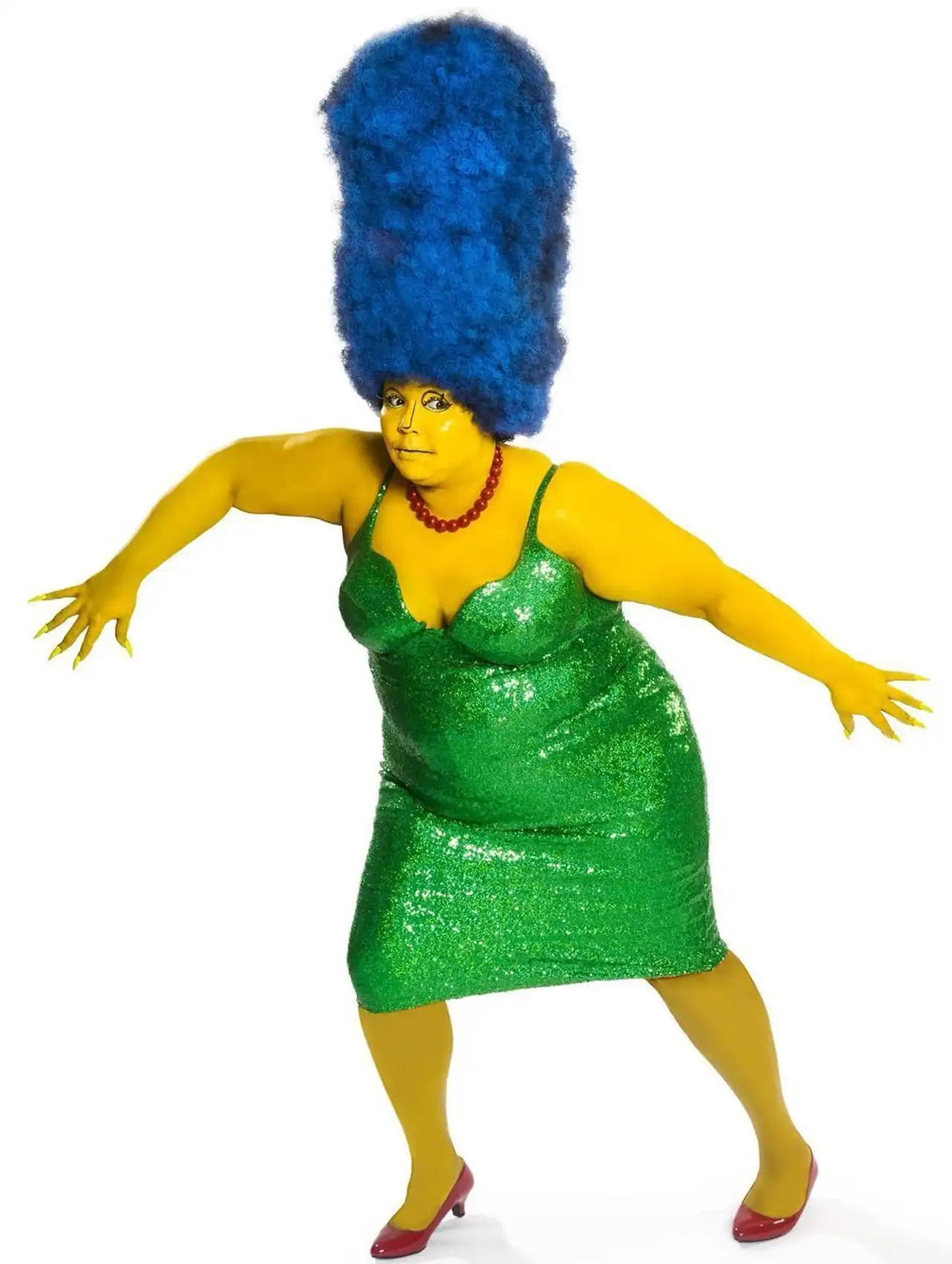 Lizzo dressed as Marge Simpson from The Simpsons with blue hair for celebrity Halloween costumes.
