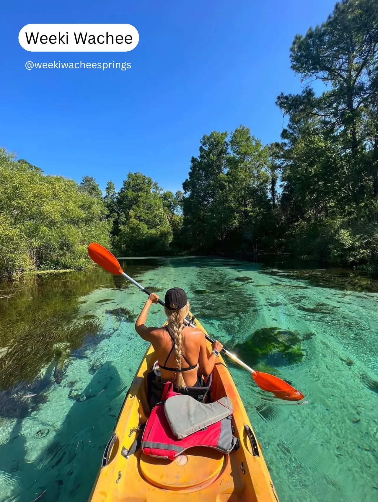 Woman kayaking through the crystal-clear waters of Weeki Wachee, one of the best springs in Florida for outdoor adventures and scenic paddling.