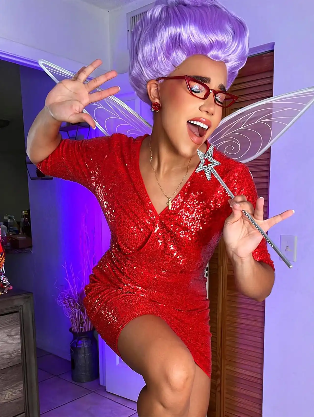 Fairy Godmother from Shrek in sparkly red dress as a viral costumes favorite