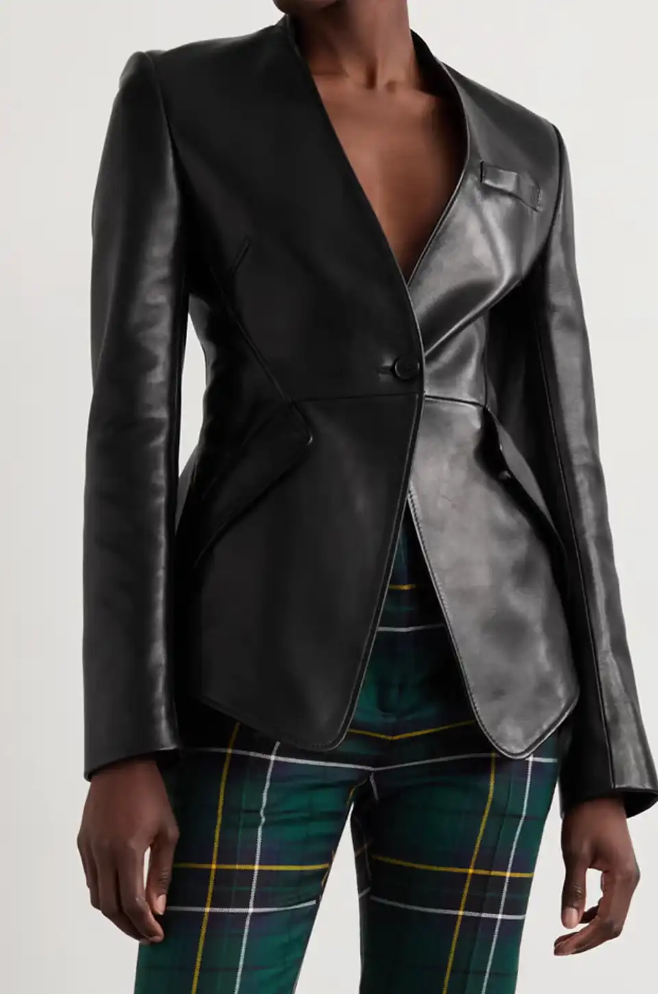 Tailored black leather blazer with a flattering hourglass silhouette