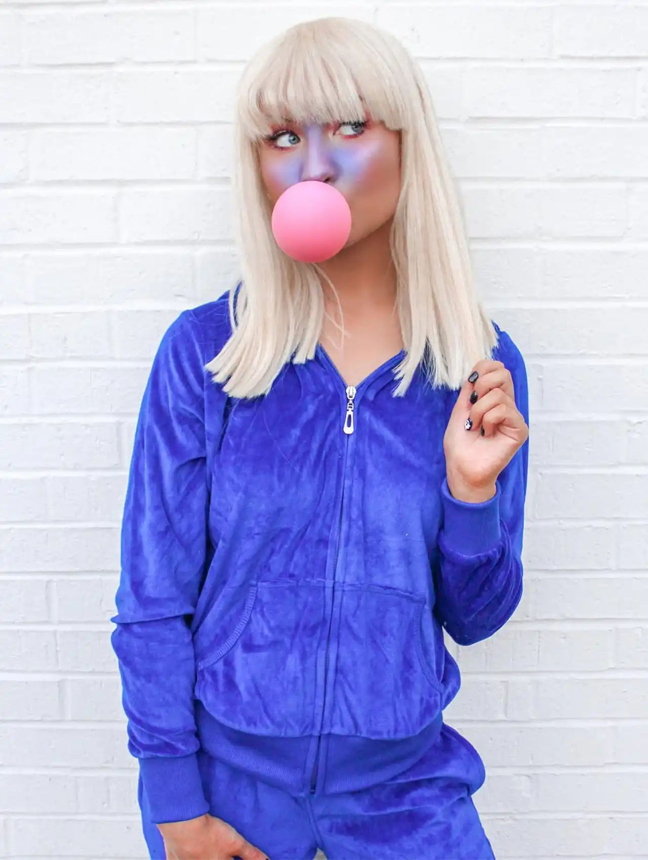 Violet Beauregarde cosplay with blue tracksuit and bubblegum as viral costumes
