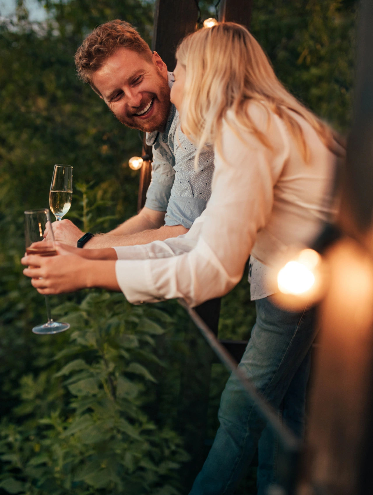 Setting the Mood Valentine’s Day Date Ideas That Feel Special, couple enjoying champagne outdoors at sunset, romantic valentine's day date ideas atmosphere