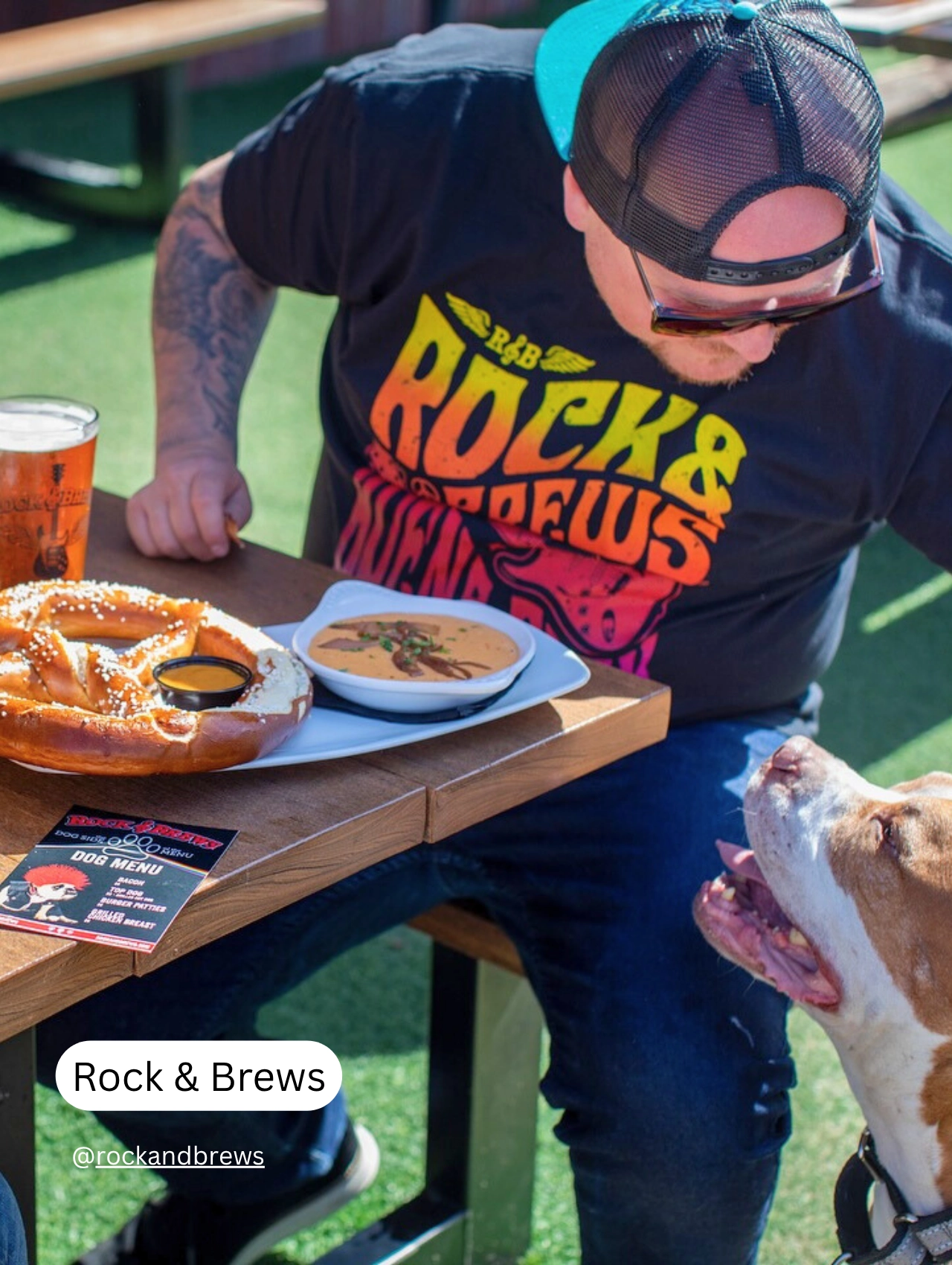 Man and dog sharing a moment at Rock & Brews, a pet friendly restaurant with a dog menu.