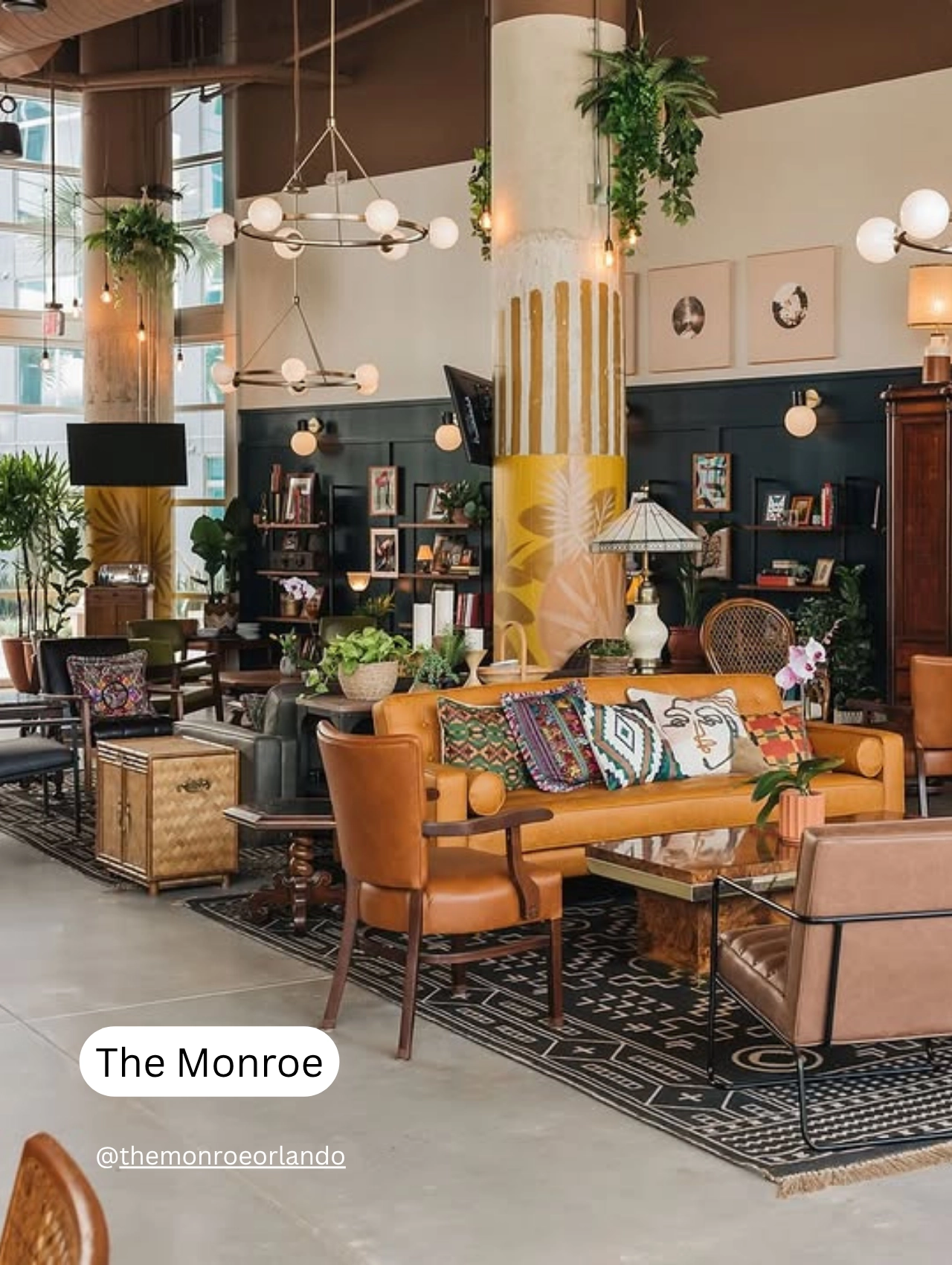 Interior of The Monroe with cozy decor and natural light, one of the modern pet friendly restaurants in Orlando.