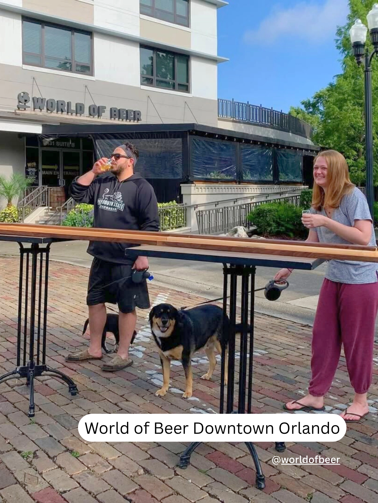 Dog and owner outside World of Beer Downtown Orlando, a favorite pet friendly restaurant.

