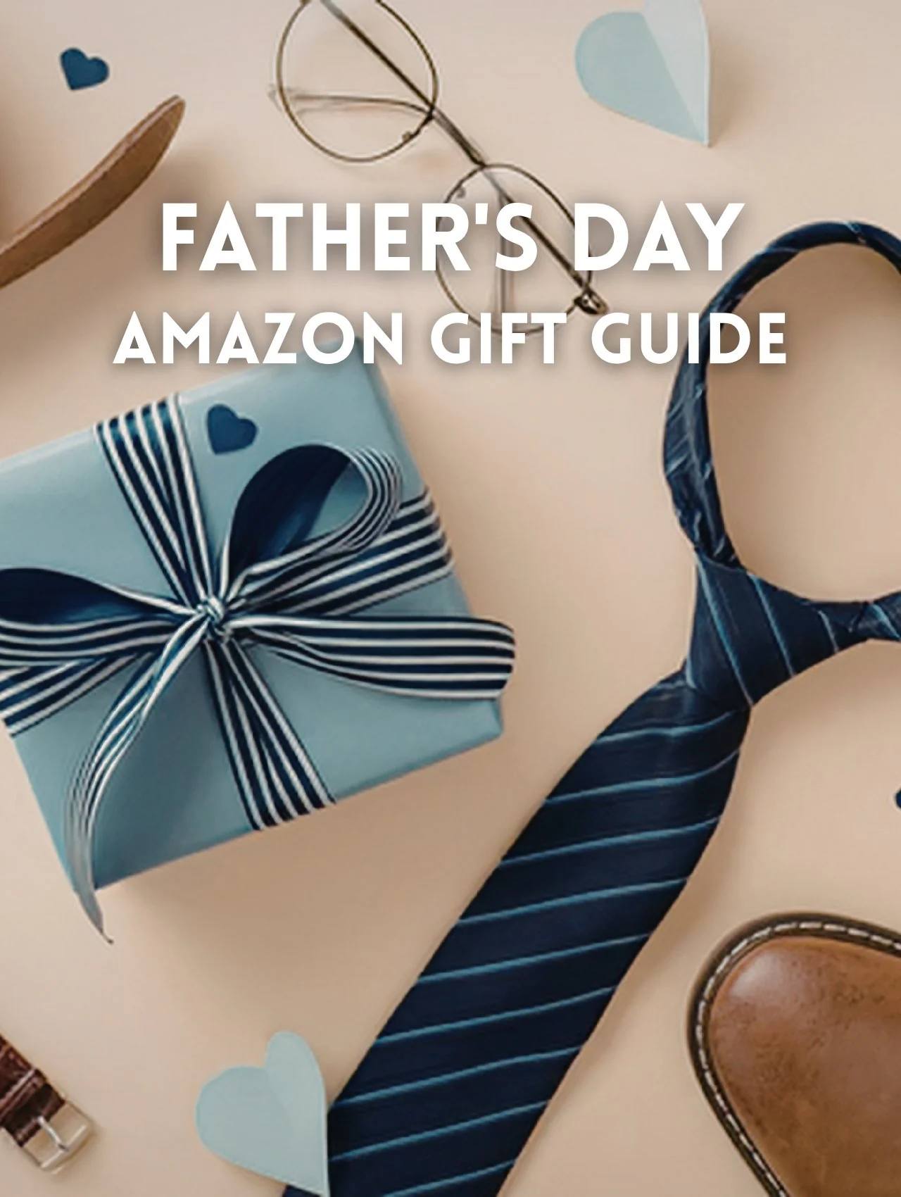 Flat lay Father's Day Amazon Gift Guide with blue gift box, navy tie, leather shoes, and glasses on beige background