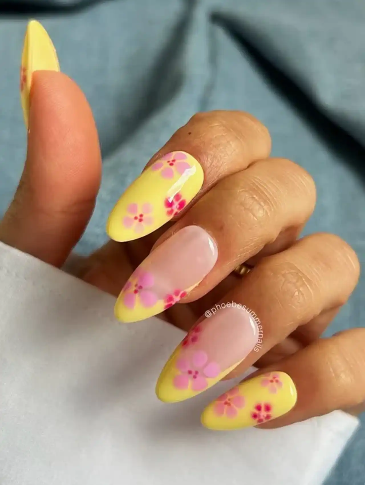 Yellow nails with dainty pink flowers, fun and colorful summer nail designs