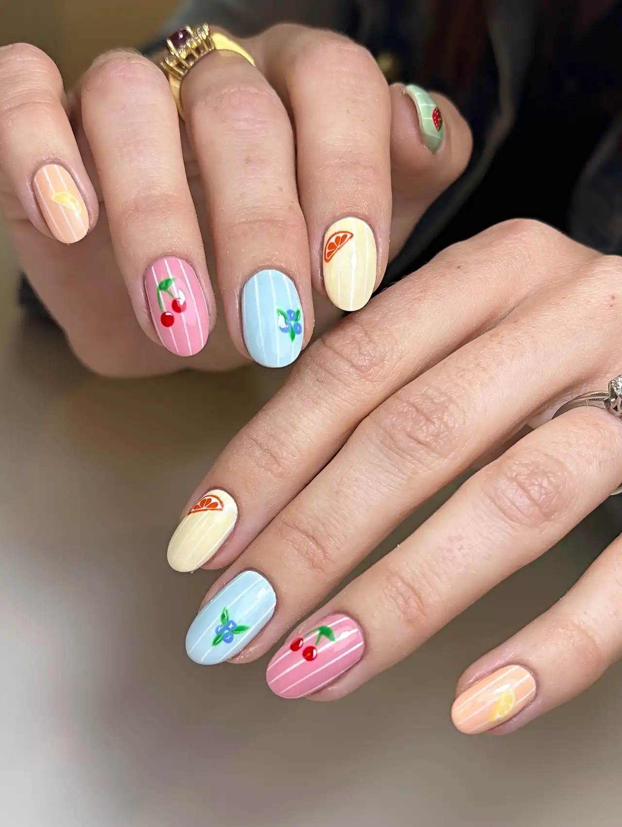 Colorful fruit-themed striped nails – summer nail designs