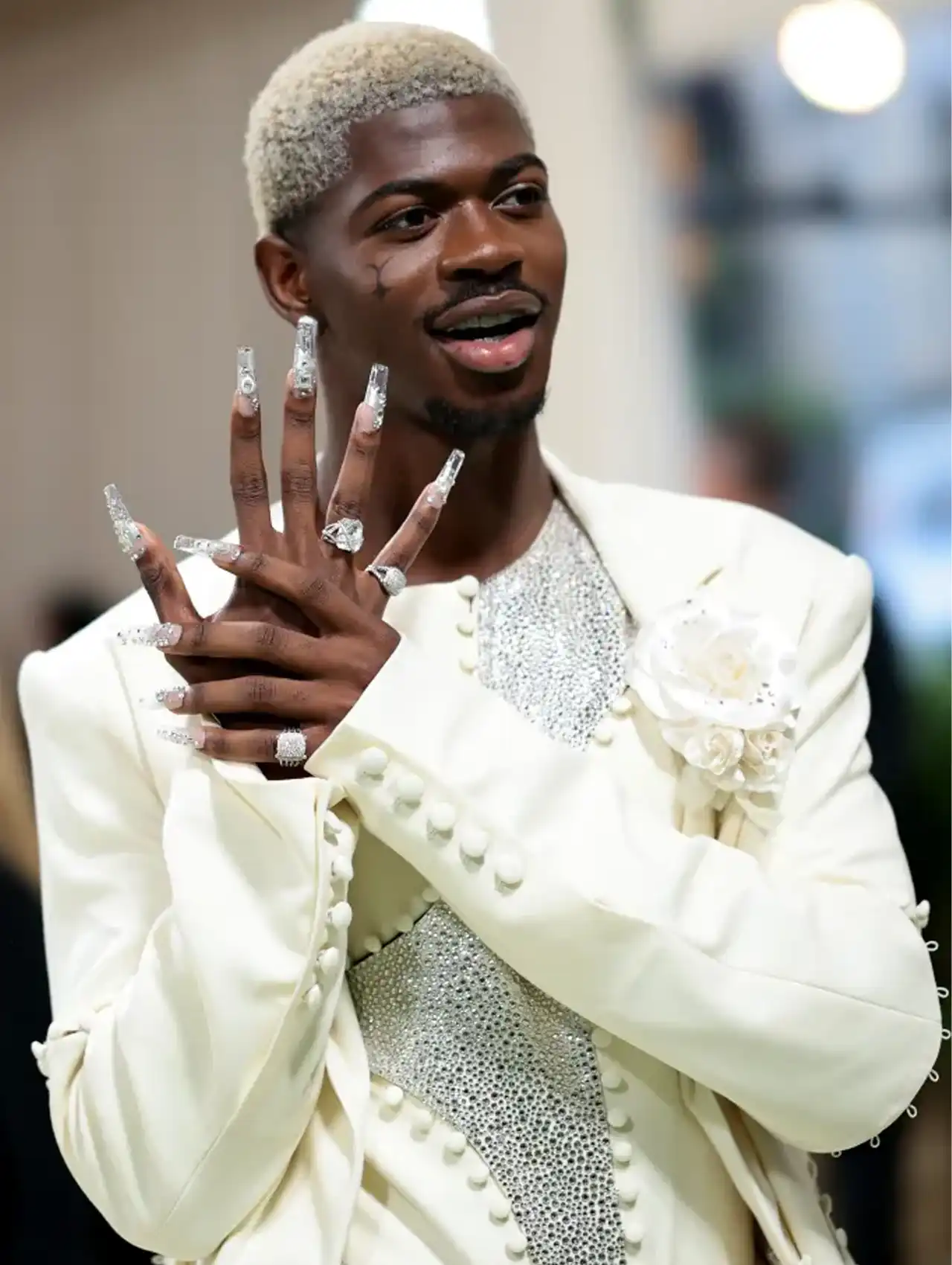 Lil Nas X flaunting sparkling silver celebrity nails at the Met Gala