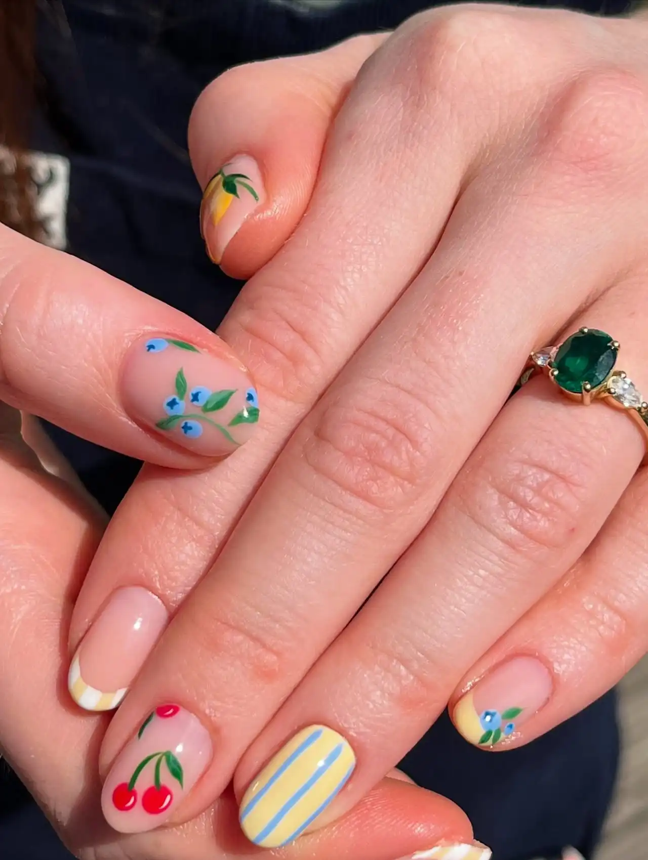 Pastel striped nails with tiny fruit art – summer nail designs