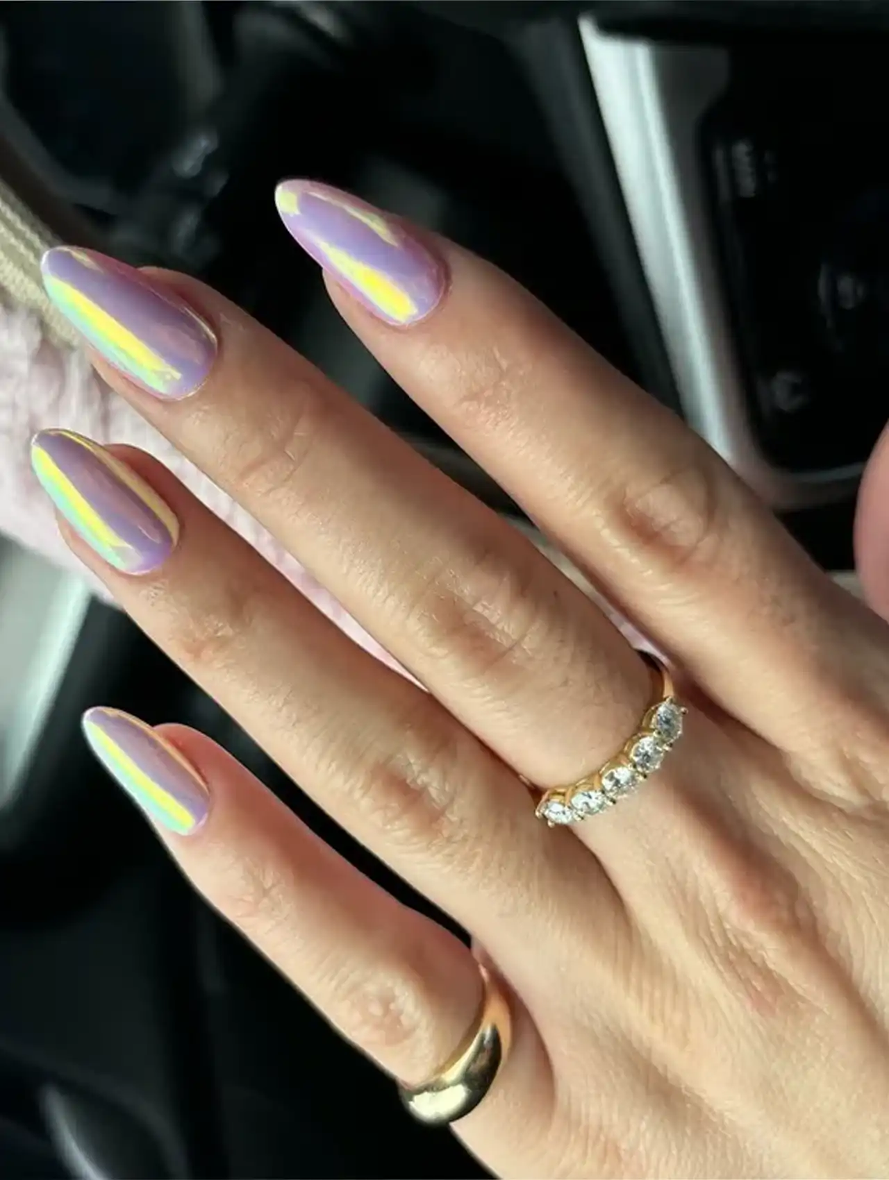 Pink holographic aurora nails with reflective chrome showcasing aurora nail design ideas